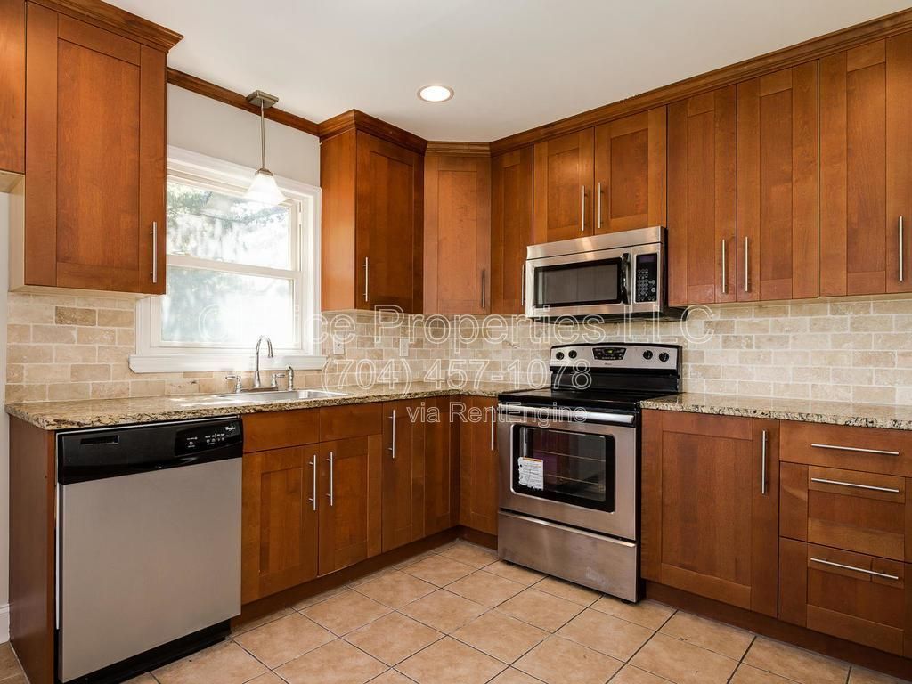 All brick, corner lot with open floor plan, huge kitchen with granite countertops! property image