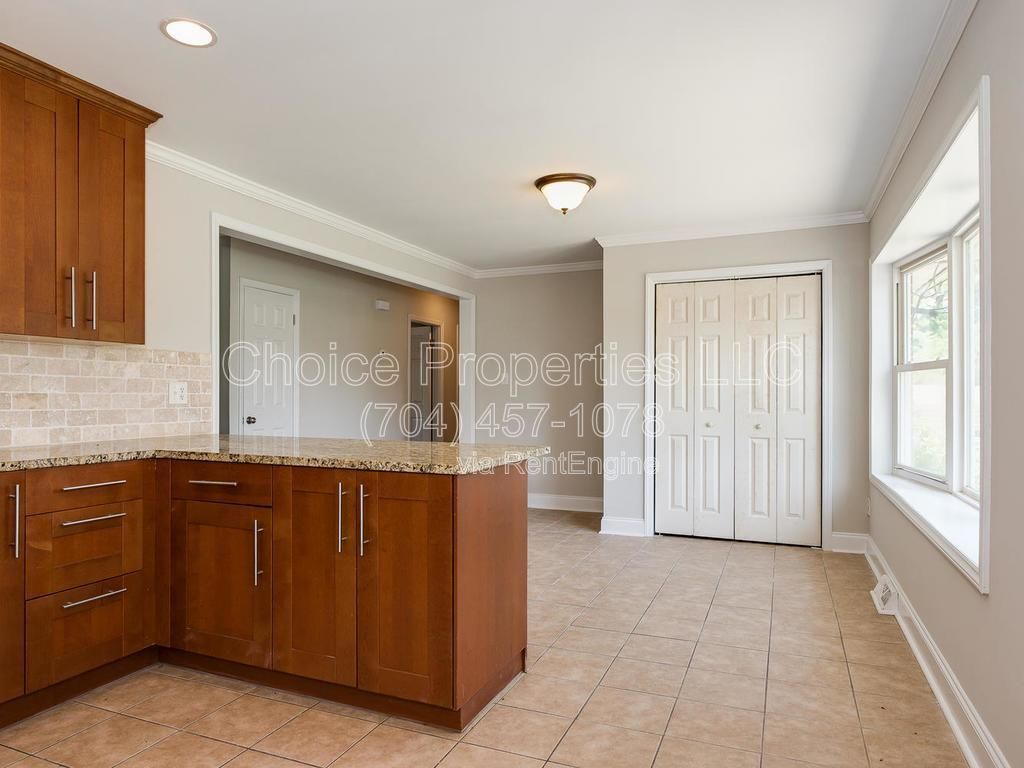 All brick, corner lot with open floor plan, huge kitchen with granite countertops! property image