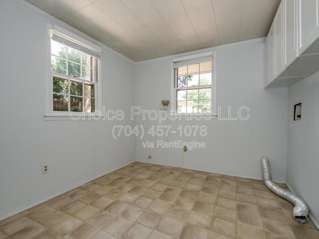 Madison Park ranch home with approx. 1 acre cul-de-sac lot that backs up to Marion Dahl/Queens Sports center! property image